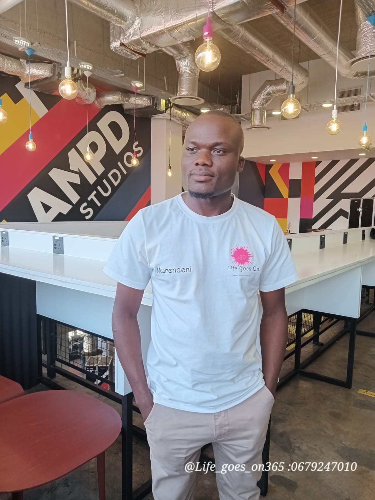 Life Goes On team member wearing branded clothing